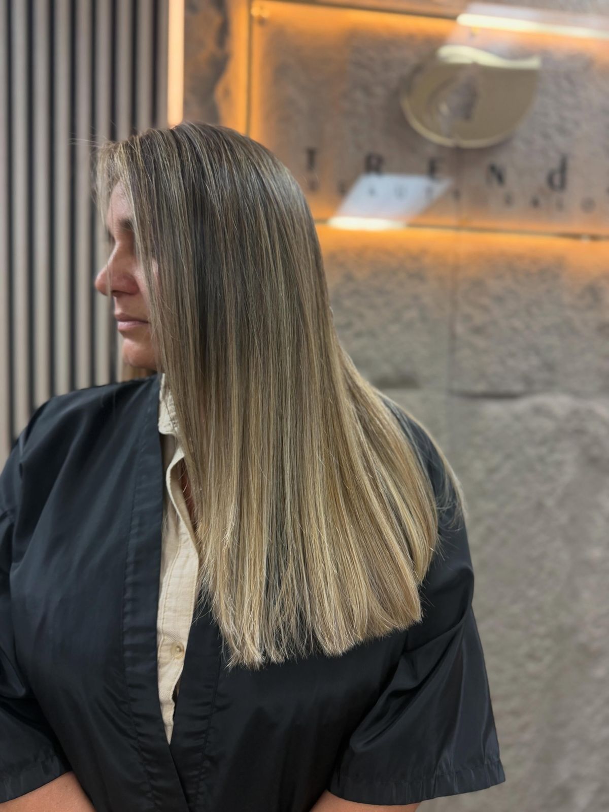Balayage refresh with smooth, bright blonde tones