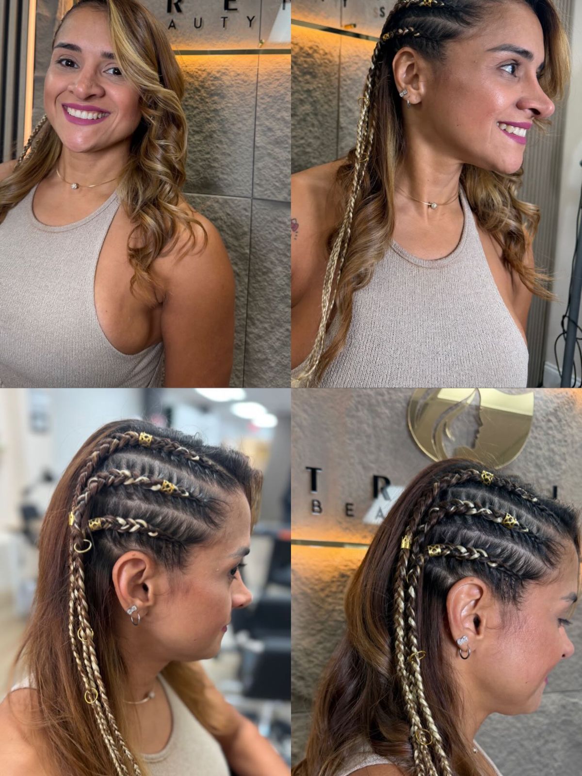 Happy client with gold-accented braids styled at the salon